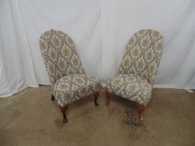 Pair of upholstered chairs standing on cabriole legs to front and shaped legs to back - 18.75" x