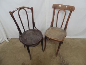 Two similar bentwood chairs both standing on splay legs Please note descriptions are not condition