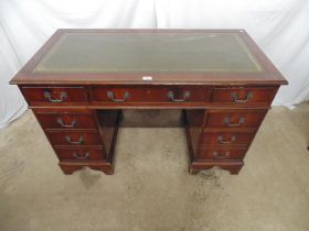 Reproduction mahogany twin pedestal writing desk with green leather gilt tooled writing surface over