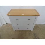 Modern oak top chest of three drawers with grey finish to base, having three long drawers with