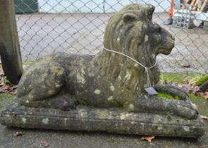 Weathered 20th century statue of a recumbent lion - 35" x 12.5" x 21.5" tall Please note