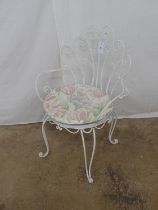 Ornate scroll work tub style chair with cushion, standing on tapering cabriole legs - 23.25" x 33"