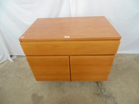 Mid century cabinet with single drawer over two cupboard doors opening to reveal single space
