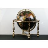 Black agate gemstone globe on a brass effect stand with compass inset to base, 330mm globe diameter,