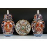 Chinese pair of Imari lidded vases, baluster form, with floral and foliate decoration, Foo Dog