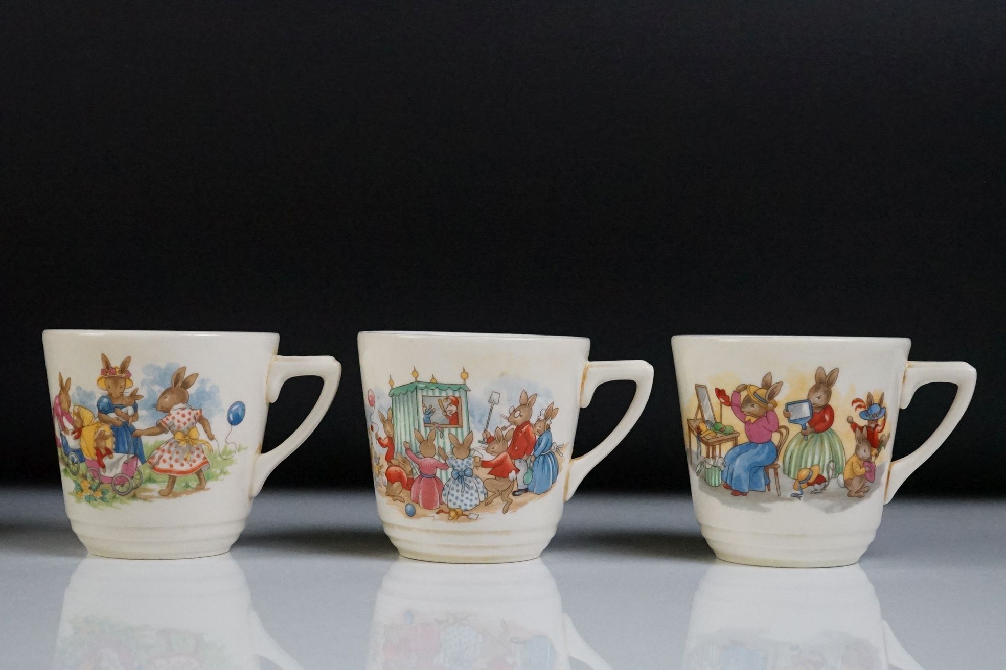 Royal Doulton Bunnykins ceramics, 13 items, to include 3 teacups & saucers, 2 tea plates, 3 lunch - Image 13 of 14