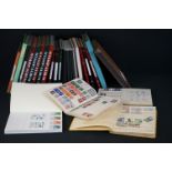 A large collection of world stamps contained within approx twenty five albums to include mint