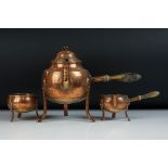 Arts and Crafts hammered copper raised tea set comprising teapot & cover with wooden side handle,