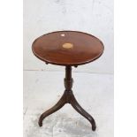 George III Mahogany Tilt Top Table, the inlaid circular tray top raised on a turned column and three
