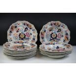 19th Century Stone China set of 10 plates with floral overpainted decoration and gilt highlights,