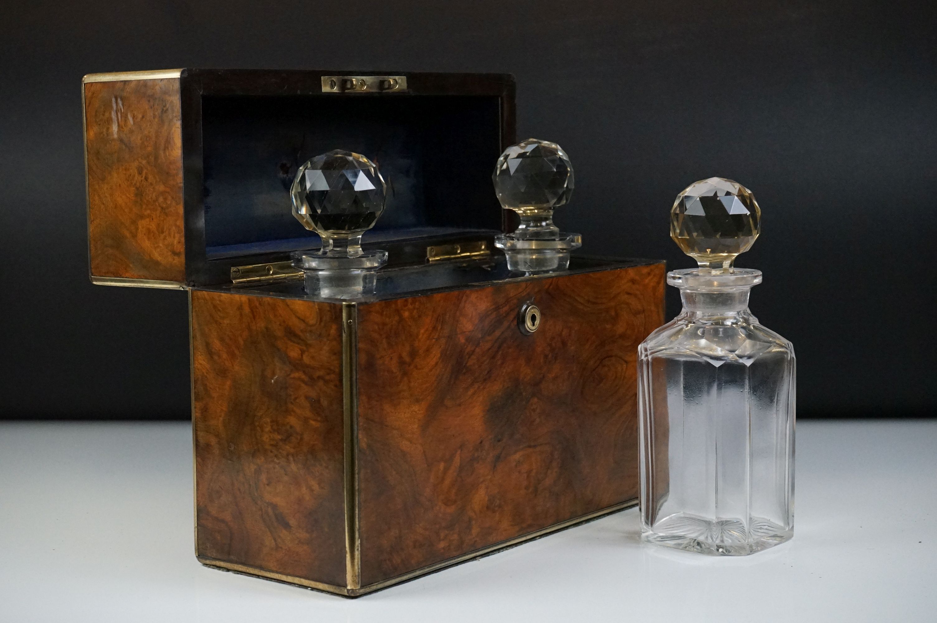 Victorian burr walnut brass-bound three bottle tantalus, containing three matching cut glass - Image 6 of 10