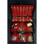 A collection of vintage and contemporary costume jewellery contained within a jewellery box.