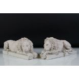 Pair of plaster recumbent lion garnitures, after Antonio Canova, mounted on rectangular bases,