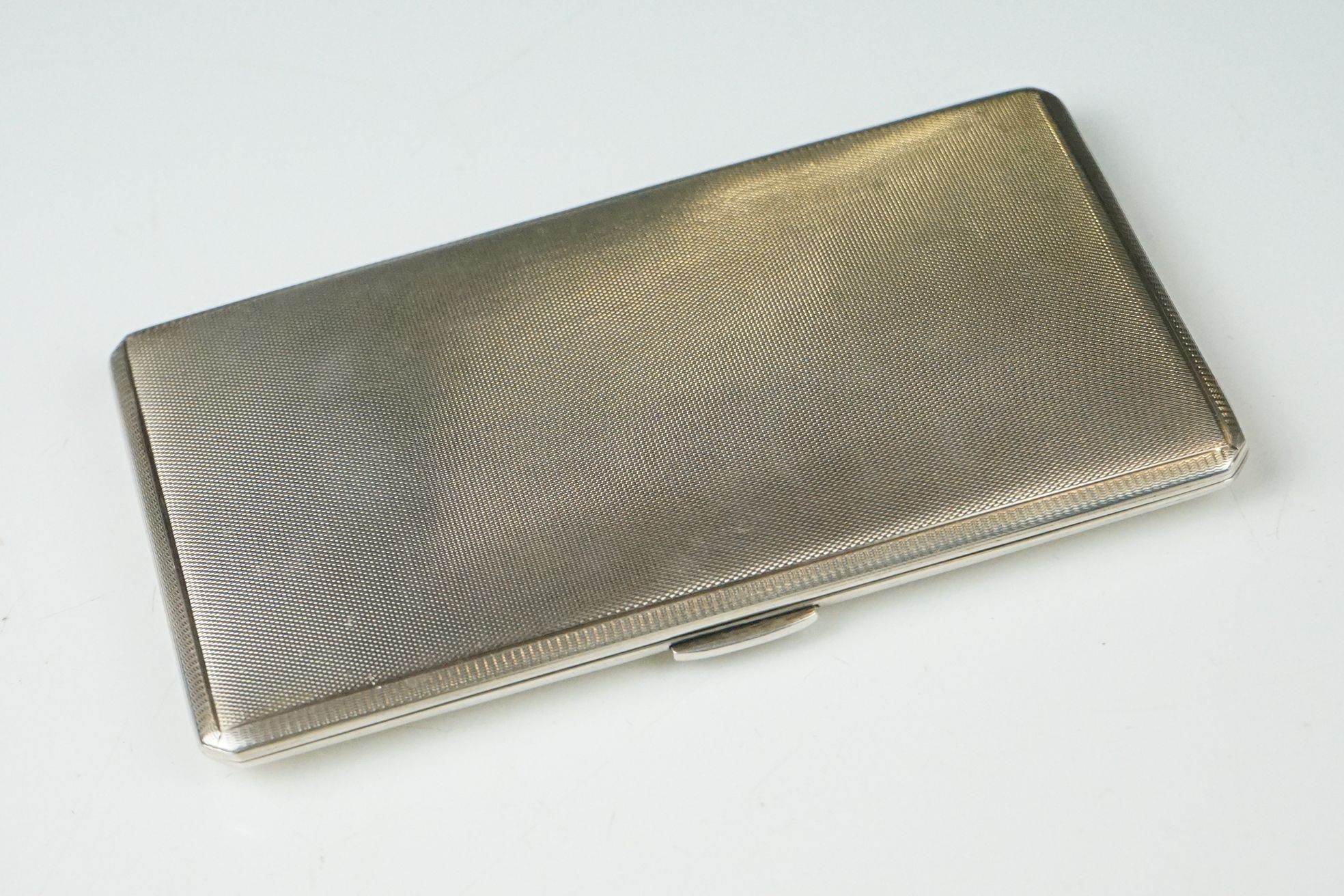 A fully hallmarked sterling silver cigarette case, assay marked for Birmingham and maker marked - Image 3 of 5
