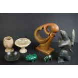 A small collection of mixed stoneware to include a goblet, trinket dishes and carved animals.