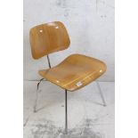 In the manner of Charles & Ray Eames, LCM Lounge style Chair with plywood seat and back, polished