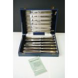 A cased set of silver plated fish knives and forks.