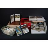 A large collection of mixed (Mainly topographical) postcards contained within four boxes.