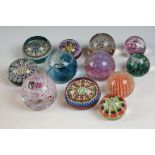Collection of 12 glass paperweights to include 4 x Perthshire millefiori & latticino paperweights (