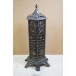 Late Victorian pierced cast iron conservatory heater, of hexagonal form, with gothic style