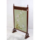 Victorian Mahogany Firescreen with blind fretwork carving, inset with a Chinese style silk