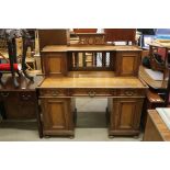 Late Victorian Oak and Burr Maple Twin Pedestal Writing Desk, the raised upper section with carved