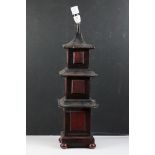 Austin ' The Home Collection ' pagoda form composition table lamp, raised on four bun feet, measures