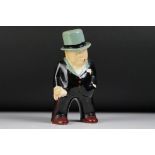 Bristol pottery painted figure of Winston Churchill, printed mark to base, 19.5cm high