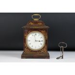 Early 20th Century Japanned lacquered wooden clock with Roman numerals on a white dial with convex