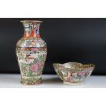 Chinese Cantonese Famille Rose vase of baluster form, decorated with panels depicting figures,