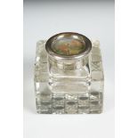 Cut glass inkwell of square form with hand-painted hunting scene to hinged silver plated lid,