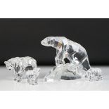 Four Swarovski Crystal polar bear ornaments to include a large polar bear raised on a naturalistic