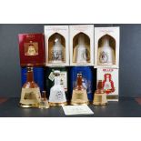 A collection of ceramic Bell's whisky bottles to include commemorative examples.