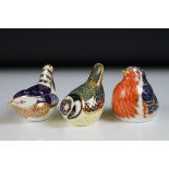 Three Royal Crown Derby bird paperweights to include an Imari Robin (silver stopper), Wren (gold