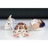 Three Royal Crown Derby animal paperweights to include an Imari Tortoise (gold stopper), Rabbit (