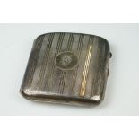 A fully hallmarked sterling silver cigarette case, assay marked for Chester and maker marked for