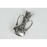 Silver vase shaped posy brooch