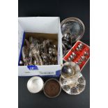 A collection of mixed silver plated items to include flatware, bottle coaster, cruet set...etc.