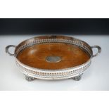 Early 20th Century oak and silver plate twin-handled gallery tray, of oval form, with pierced