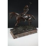 Joseph Cuvelier (French, 1833-1878) Bronze of a Polo player, mounted on a rectangular marble base,