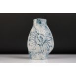 Carn Pottery of Penzance, Cornwall vase of asymmetrical form, with relief tube-lined sunflower