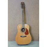 Cort acoustic guitar, with inner paper label reading 'model no. ERTN-70 NS, Serial No.