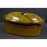 Group of kitchenware and ovenware to include a 19th century Wedgwood caneware lidded game tureen