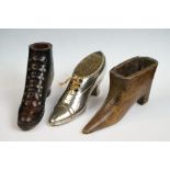 A vintage pin cushion in the form of a shoe together with two wooden shoe shuff boxes.