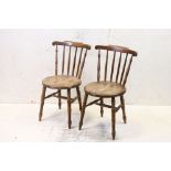 Pair of Late 19th / Early 20th century Stickback Kitchen Chairs with circular solid seats, 46cm wide