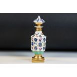 French porcelain vase & stopper of faceted form, with enamelled floral and scrolling decoration on a
