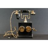 Film / stage prop telephone in the form of an early-to-mid 20th century example, with painted wooden