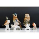 Three Karl Ens porcelain bird figures to include a Jay, 16.5cm high, Owl perched on a branch, and