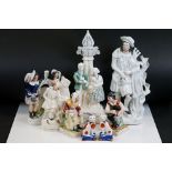 Eight Staffordshire pottery figures to include a cobbler and his wife, Queen Elizabeth Silver