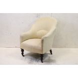 19th century Cream Upholstered Armchair raised on turned front legs with castors, 63cm wide x 84cm
